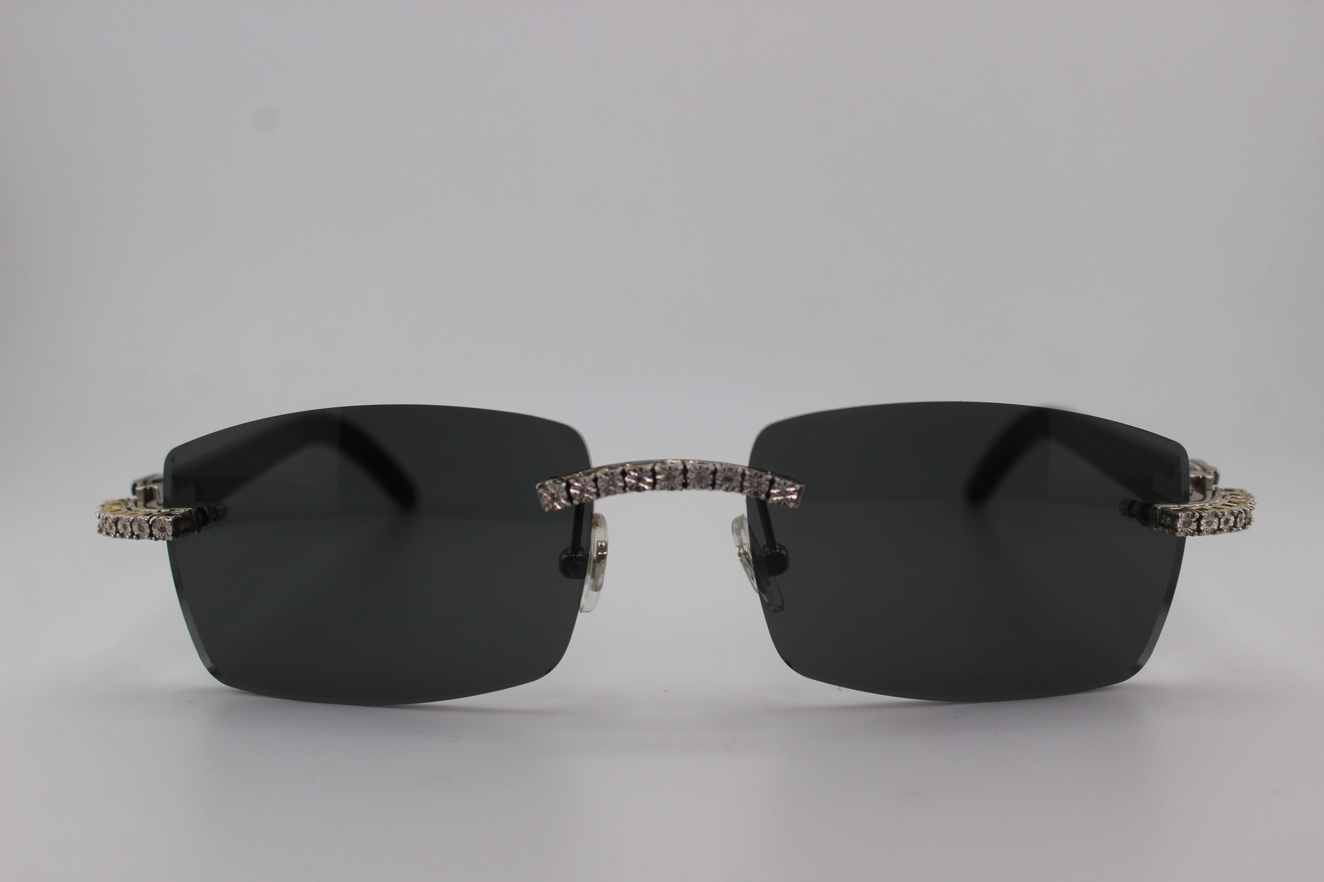 Luxury handcrafted white buffalo horn sunglasses featuring genuine diamonds set in diamond cut sterling silver discs with prong setting, white genuine horn temples, and 55mm dark tint UV400 lenses - custom functional face art made in Michigan