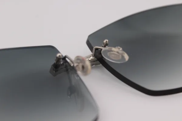 Handcrafted white buffalo horn sunglasses featuring endless iced nose bridge with sparkling stones, genuine white ox horn temples, and 58mm grey tint UV400 protection lenses - custom functional face art made in Michigan