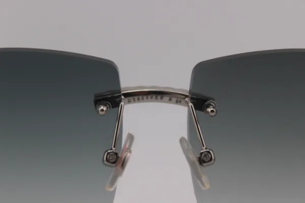 Handcrafted white buffalo horn sunglasses featuring endless iced nose bridge with sparkling stones, genuine white ox horn temples, and 58mm grey tint UV400 protection lenses - custom functional face art made in Michigan