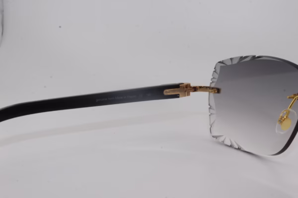 Handcrafted buffalo horn sunglasses featuring 2.2 carat VVS1 moissanite stones in low-profile prong setting on nose bridge, black genuine horn temples, and 58mm grey tint diamond cut lenses - one-of-a-kind functional face art made in Michigan